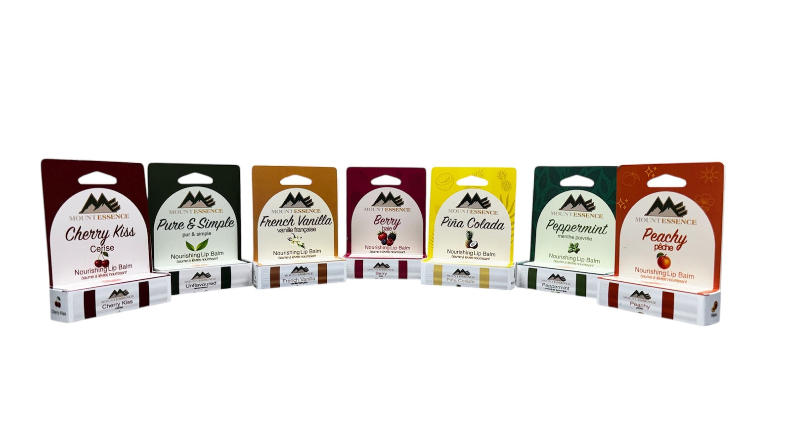 Mount Essence vegan lip balms in seven flavours — Cherry Kiss, Pure & Simple, French Vanilla, Berry, Piña Colada, Peppermint, and Peachy